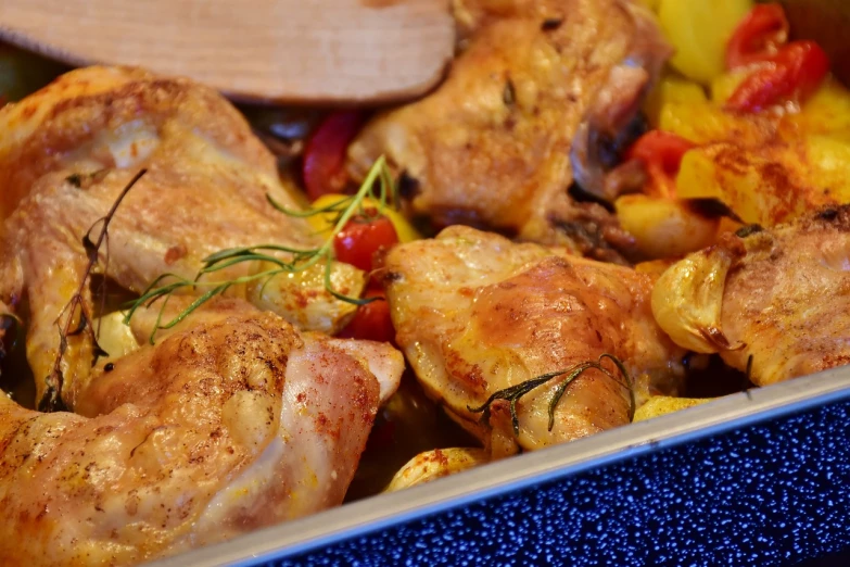 a pan filled with chicken and vegetables with a wooden spoon, by Maksimilijan Vanka, pixabay, renaissance, closeup 4k, chickens, oven, ( ultra realistic