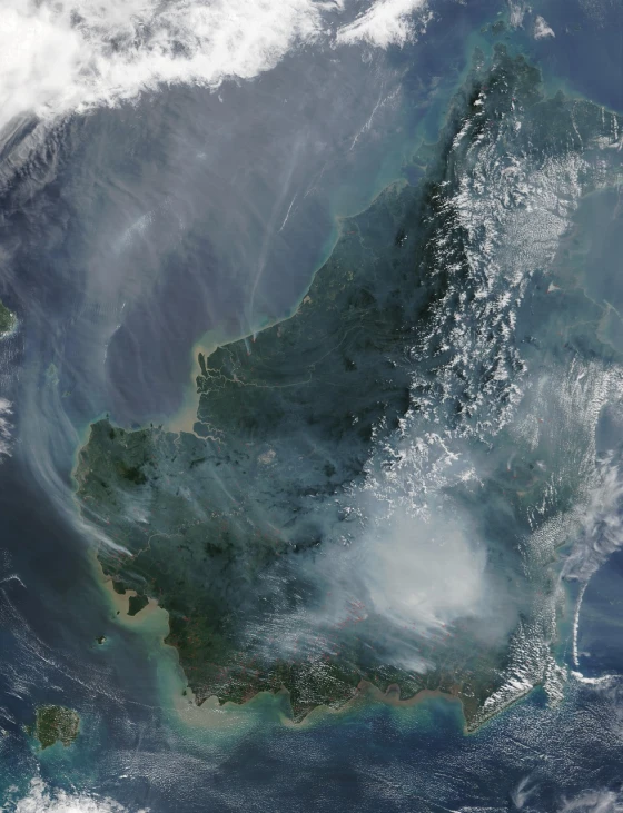 a satellite view of a large body of water, sumatraism, background ( smoke, kuala lumpur, smoky laboratory, high-res