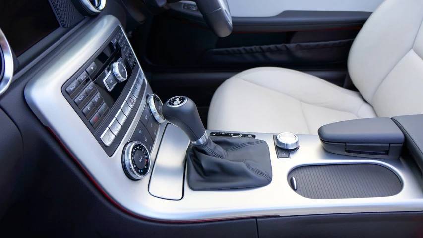 a close up of the center console of a car, shutterstock, les automatistes, convertible, slr, hyper realistic ”