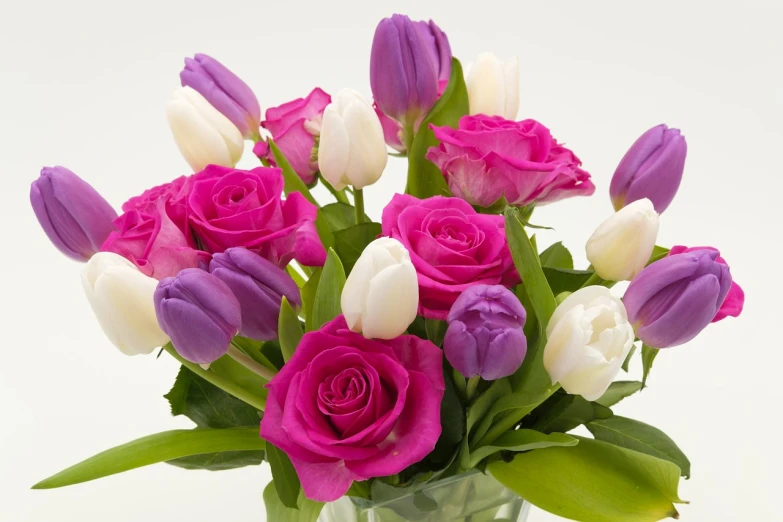 a vase filled with purple and white flowers, roses and tulips, full product shot, closeup - view, pink rose