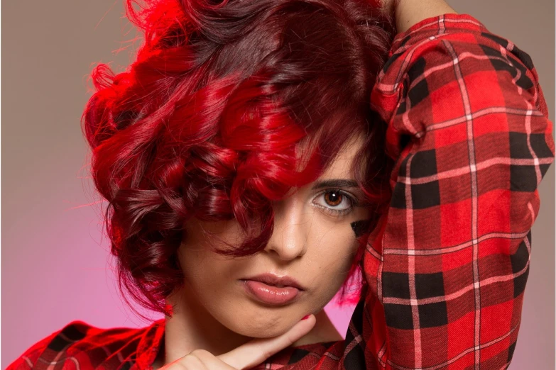 a close up of a person with red hair, inspired by Antonio Rotta, pop art, professional studio photography, short curly hair, colors red, half - length photo