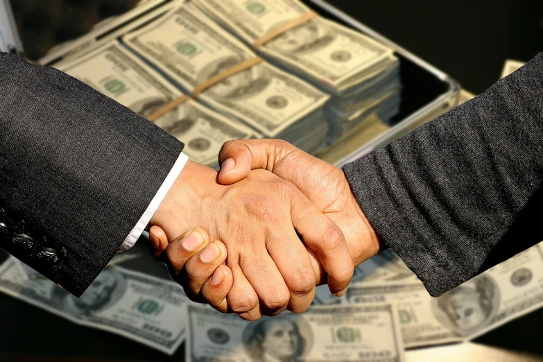 two men shaking hands in front of a pile of money, a stock photo, pixabay, sold at an auction, [ [ hyperrealistic ] ], bruce kaiser, jemal shabazz