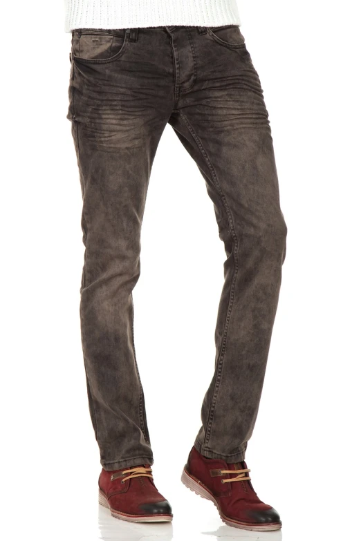 a man standing with his hands in his pockets, inspired by derek zabrocki, hot topic, taupe, dark washed tint black, slim