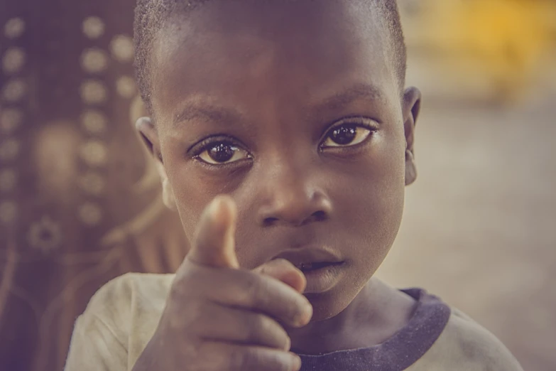 a close up of a child pointing at the camera, by Sebastian Spreng, african man, fine detail post processing, thumbs up, god looking at me