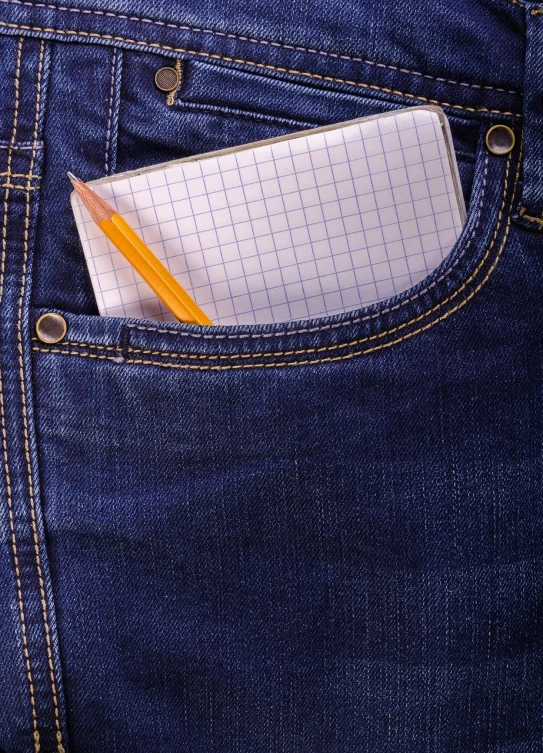 a pencil sticking out of the back pocket of a pair of jeans, a photo, notebook, full res, close up photo