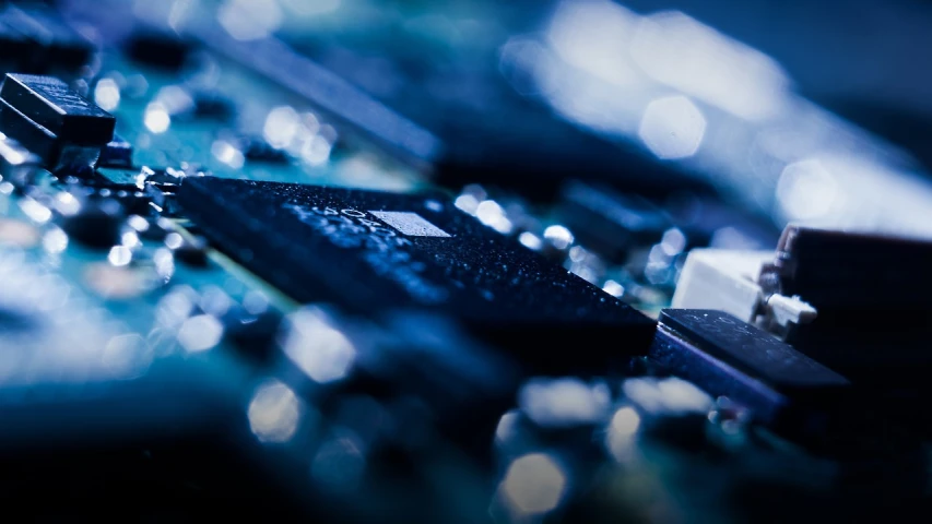 a close up of a computer mother board, by Adam Marczyński, unsplash, digital banner, glittering, looking partly to the left, close establishing shot