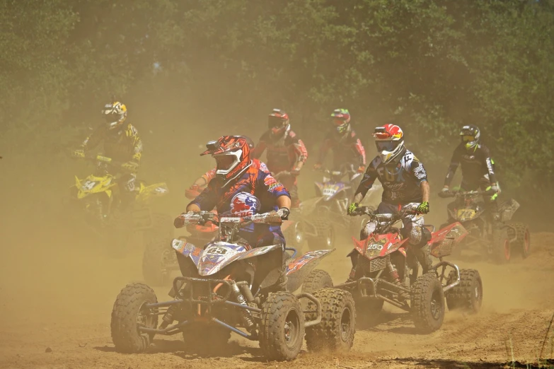 a group of people riding atvs down a dirt road, a picture, flickr, figuration libre, tournament, dirt and grawel in air, benjamin vnuk, panels