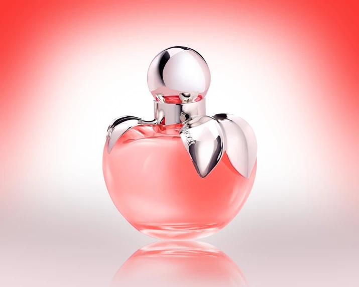 a bottle of perfume sitting on top of a table, digital art, inspired by Luma Rouge, shutterstock, red realistic 3 d render, angel, detailed product photo, peach