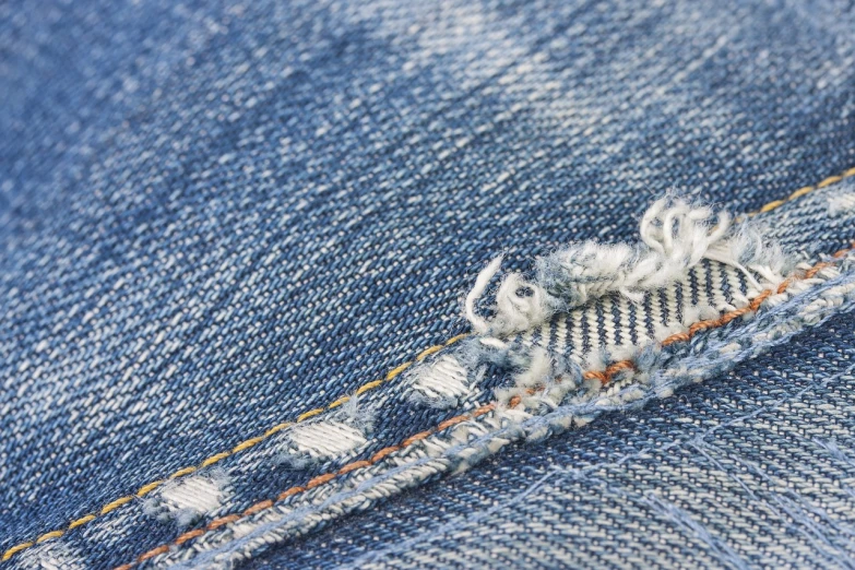 a close up of a hole in a pair of jeans, inspired by Saitō Kiyoshi, highly detailed-h 704, faded memories, highly_detailded, fine line detail
