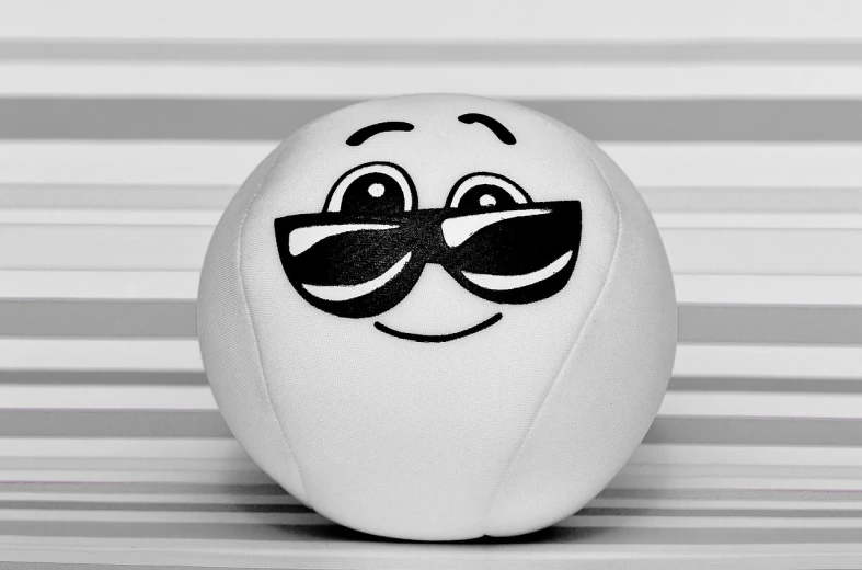 a close up of a white ball with sunglasses on it, a black and white photo, funny emoji, toy commercial photo, cel-shaded, fumo plush