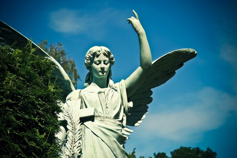 a close up of a statue of an angel, a statue, by Erwin Bowien, pixabay, waving, mid shot photo