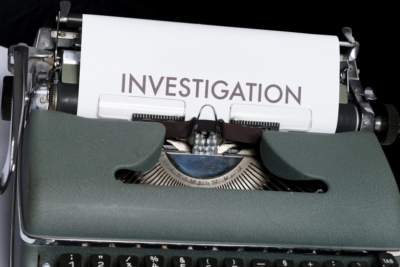 a close up of a typewriter with a paper on it, a stock photo, investigation, warning, insignia, inspect in inventory image