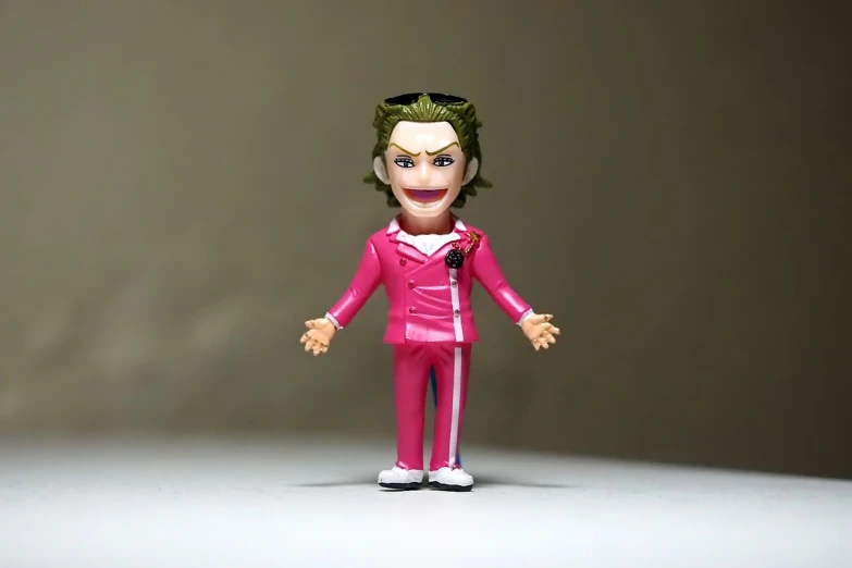 a close up of a toy figure of a person, a picture, neo-dada, elon musk as joker, ((pink)), ultra high quality, kubrick