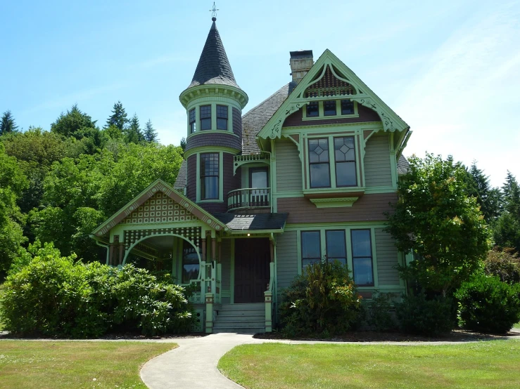 a large green house sitting on top of a lush green field, a portrait, by Jim Nelson, flickr, art nouveau, richly decorated victorian house, washington state, turrets, interior of a victorian house