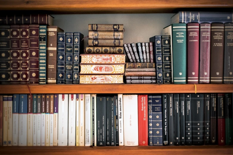 a book shelf filled with lots of books, a picture, by Niko Henrichon, pexels, hyperrealism, defense attorney, medical book, taken in 1 9 9 7, with intricate detail