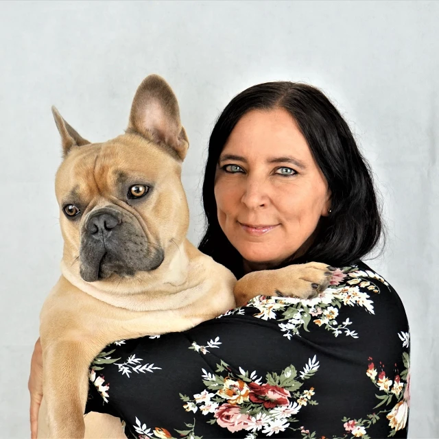 a woman holding a dog in her arms, a portrait, by Martina Krupičková, pixabay contest winner, french bulldog, on clear background, aged 4 0, frontal pose