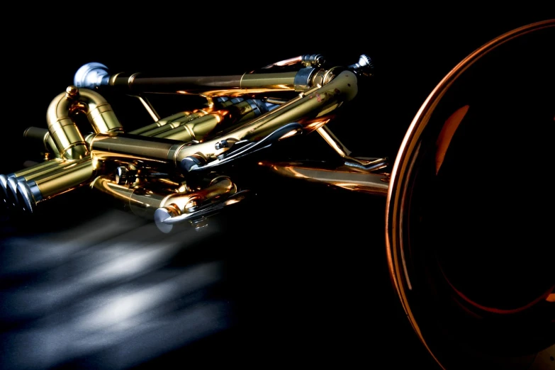 a close up of a trumpet on a black background, concept art, by Thomas Häfner, kinetic art, futuristic wheelchair, shiny gold, car shot, high-speed sports photography