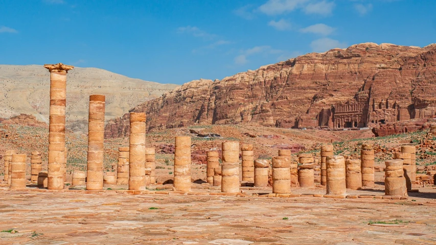 the ruins of the ancient city of palmyra in jordan, by Cafer Bater, pexels contest winner, fine art, wadi rum, marble columns in background, 1128x191 resolution, roman festival backdrop