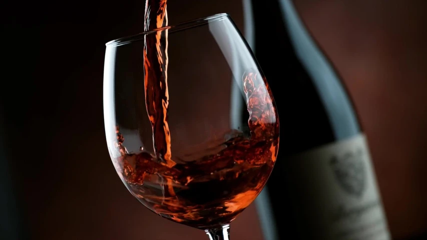 a bottle of wine being poured into a wine glass, by Alexander Fedosav, photograph credit: ap, just beautiful, animation, close-up shot