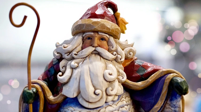 a figurine of a santa claus holding a staff, flickr, folk art, professional woodcarving, full of colors and rich detail, john park, photograph credit: ap