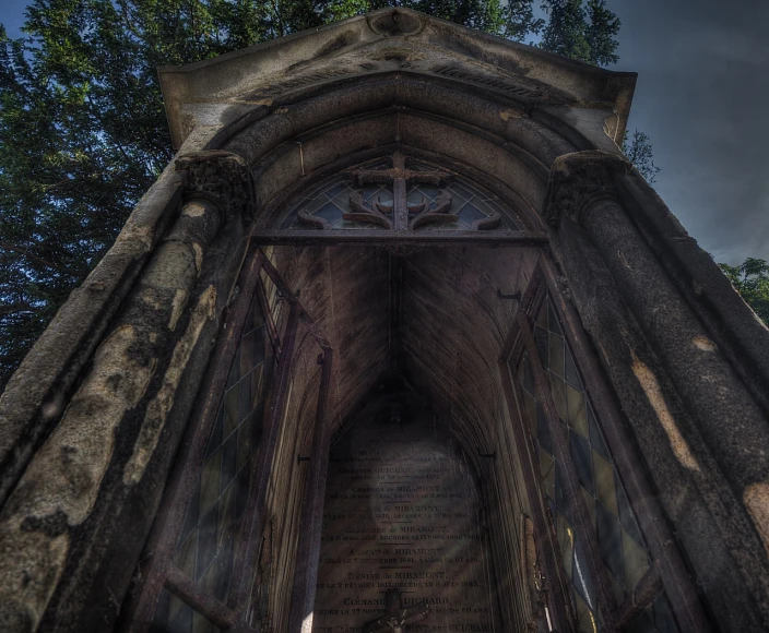 a very tall building with a clock on top of it, by Alexander Robertson, flickr, gothic art, the graveyard!!, god rays pass through the window, doorway, hdr color