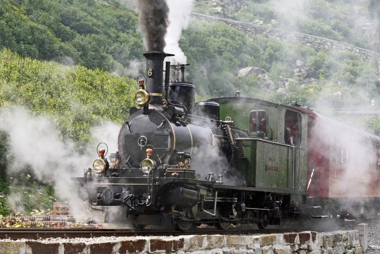 a train traveling down train tracks next to a forest, a picture, figuration libre, brass and steam technology, jörmungandr, in the hillside, historical setting