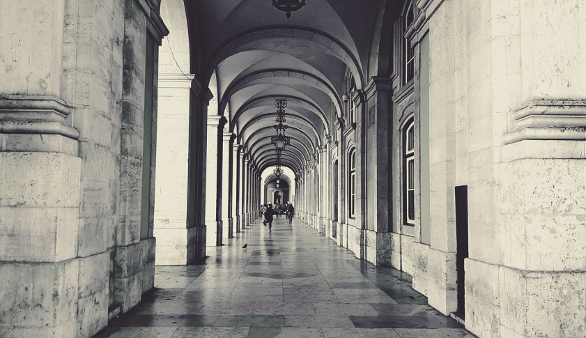 a black and white photo of a hallway in a building, pexels contest winner, baroque, the city of lisbon, retro effect, giant majestic archways, polariod