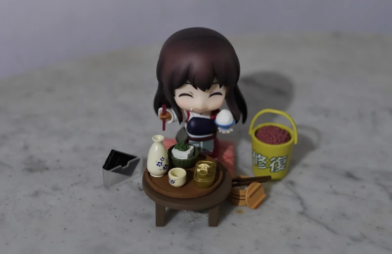 a doll that is sitting on a table, by Jin Homura, making a potion, very very well detailed image, having a snack, toy photo