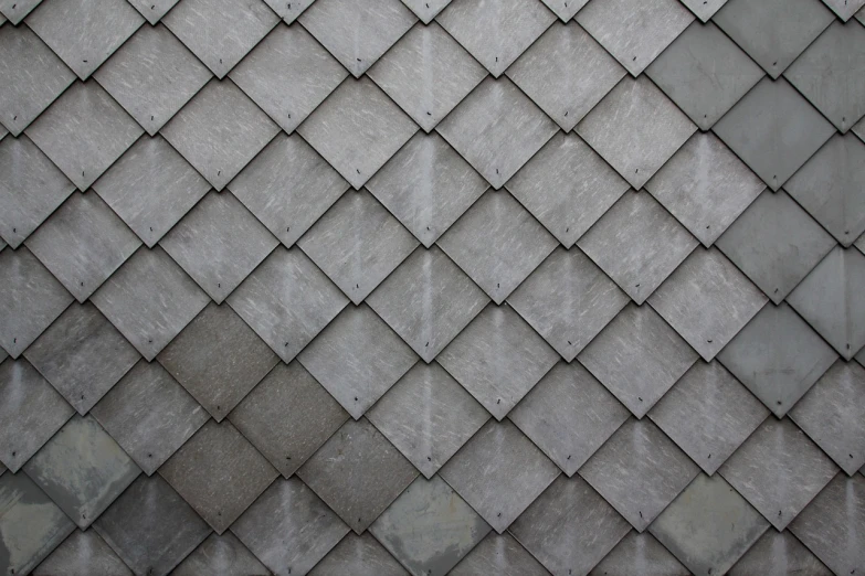 a close up of the roof of a building, inspired by Katsushika Ōi, flickr, bauhaus, diamond texture, slate, hyper realistic texture, armor plate