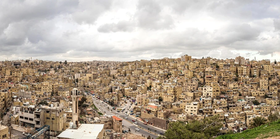 a city filled with lots of tall buildings, by Ibram Lassaw, les nabis, eternal city, superwide shot, hamar, tan