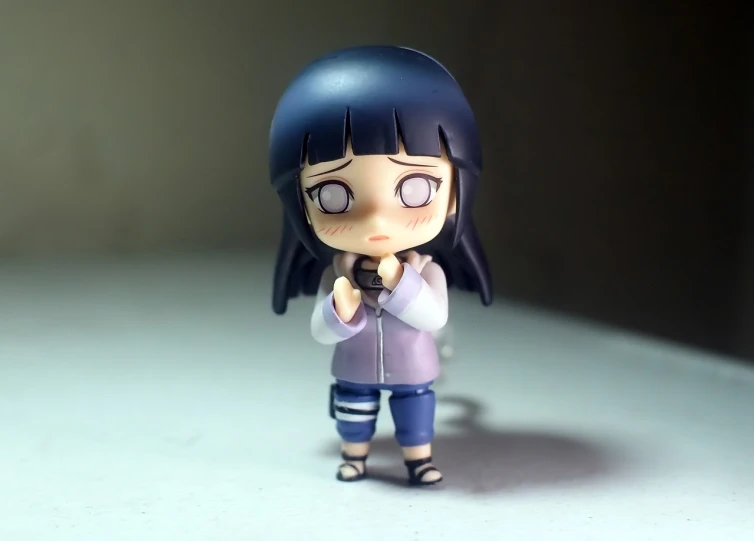 a figurine of a girl holding a cell phone, a picture, by Jin Homura, flickr, pain from naruto, cute expression, 8k!, wide shot!!!!!!