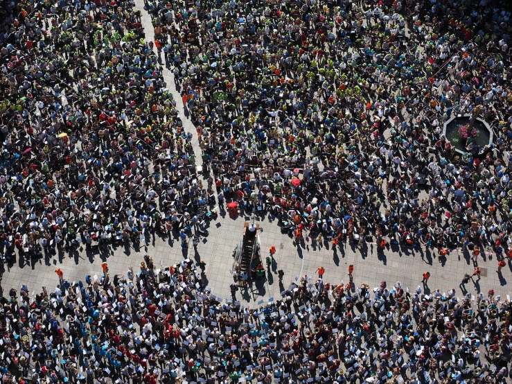 an aerial view of a large crowd of people, a photo, by Joze Ciuha, tiny person watching, ceremony, beijing, shot on sony alpha dslr-a300