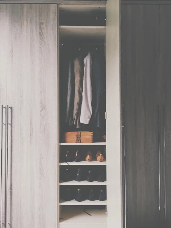 a closet filled with lots of clothes and shoes, by Matija Jama, unsplash, minimalism, 🦩🪐🐞👩🏻🦳, gentleman, white broom closet, brown and cream color scheme