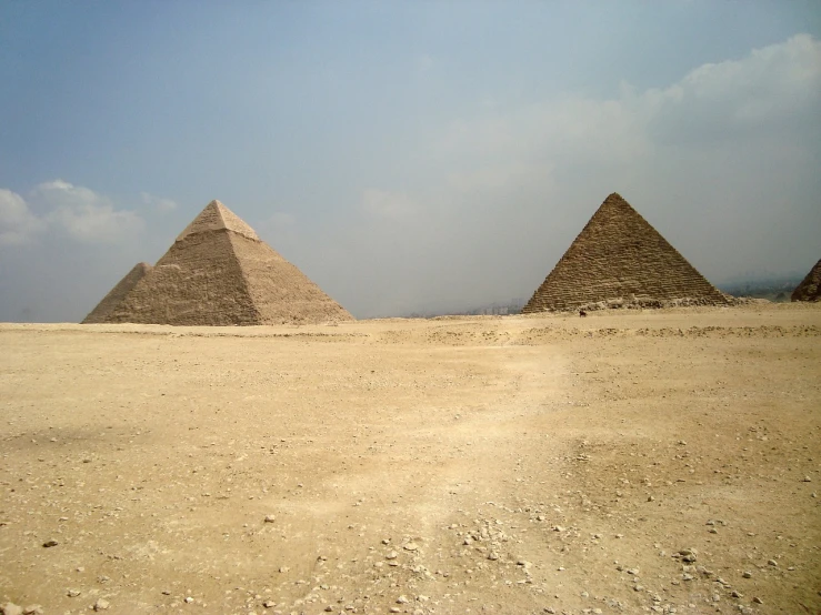 a group of three pyramids in the desert, egyptian art, flickr, minimalism, two giant towers, ground-level view, sand piled in corners, great pyramid of giza