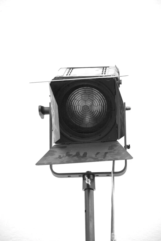 a black and white photo of a street light, a portrait, by István Csók, shutterstock, bauhaus, on white background, cinema studio lights, 1 3 5 mm!!, panavision psr r-200