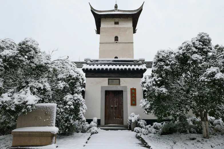 a clock tower sitting in the middle of a snow covered park, inspired by Zhang Shunzi, flickr, mingei, beautiful ancient garden behind, front facing view, guangjian huang, white daoist robes