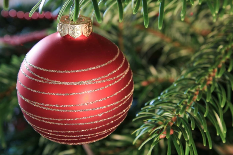 a red ornament hanging from a christmas tree, inspired by Ernest William Christmas, pexels, hd —h 1024, detail, wikipedia, information