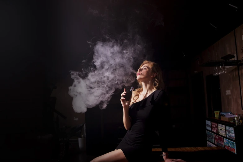 a woman smoking a cigarette in a dark room, a portrait, by Matt Cavotta, shutterstock, blonde hot woman in wine cellar, fog machine, smoking a magical bong, close full body shot