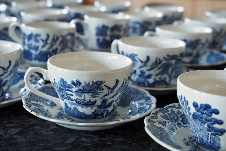 a group of blue and white cups and saucers, inspired by William Twigg-Smith, flickr, istock, beautiful surroundings, traditional chinese, custom