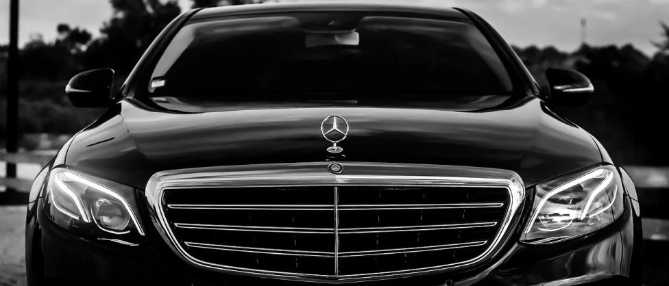 the front of a black mercedes benz benz benz benz benz benz benz benz benz benz benz benz, a black and white photo, unsplash, hd phone wallpaper, clear lines!!, hq 4k phone wallpaper, black! and white colors