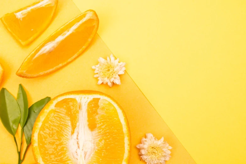 an orange cut in half on a yellow background, by Anna Haifisch, trending on unsplash, made of fruit and flowers, photoshoot for skincare brand, background image, 🦩🪐🐞👩🏻🦳