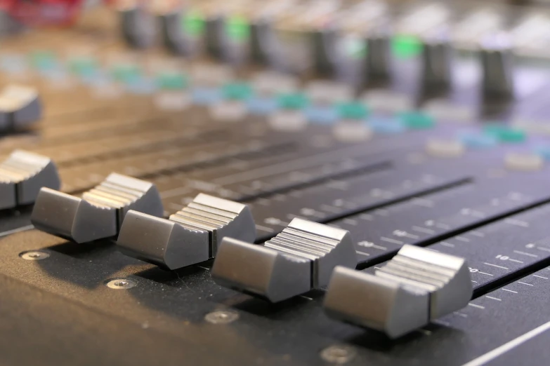 a close up of a sound board in a recording studio, an album cover, by Alison Watt, shutterstock, in a row, being mixed, sousaphones, close - up photo