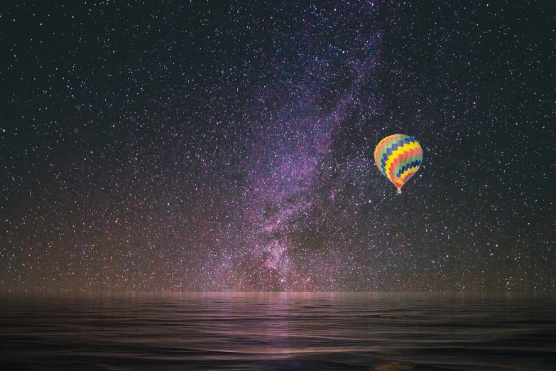 a hot air balloon flying over the ocean at night, space art, background of stars and galaxies, clear sky background, psychedelic atmosphere, minimalistic composition