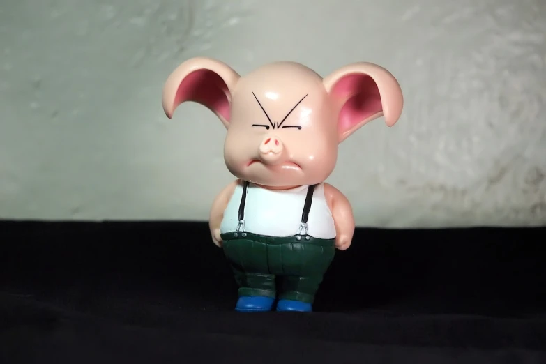 a close up of a figurine of a pig, a picture, by Hiroyuki Tajima, flickr, neo-dada, bulma from dragon ball, depressed sad expression, dwarf, 1997