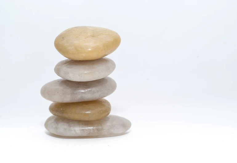 a stack of rocks sitting on top of each other, a marble sculpture, minimalism, translucent, product photo, istockphoto, four-dimensional