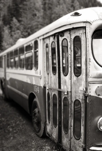 a black and white photo of an old bus, a portrait, inspired by Diane Arbus, flickr, portrait of a slightly rusty, tilt shift”, seattle, 2 0 1 2