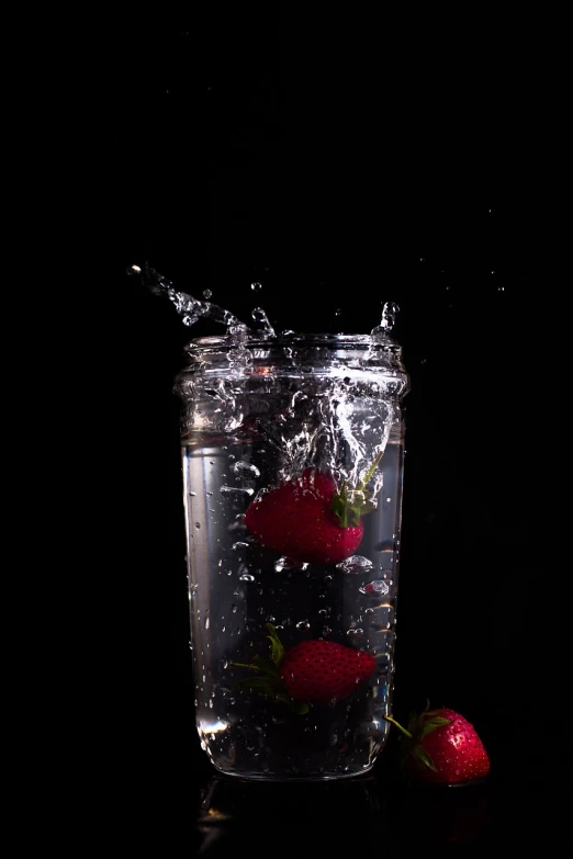 a strawberry splashing into a glass of water, a picture, by Adam Chmielowski, inside a glass jar, hd phone wallpaper, black-water-background, berries inside structure