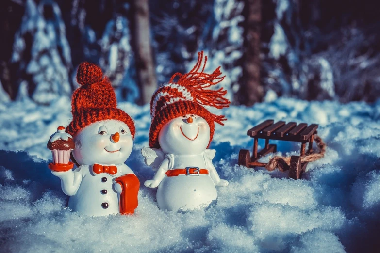 a couple of snowmen that are standing in the snow, a picture, by Alexander Brook, shutterstock, 4k uhd wallpaper, still life with snow, sweet smile, watch photo