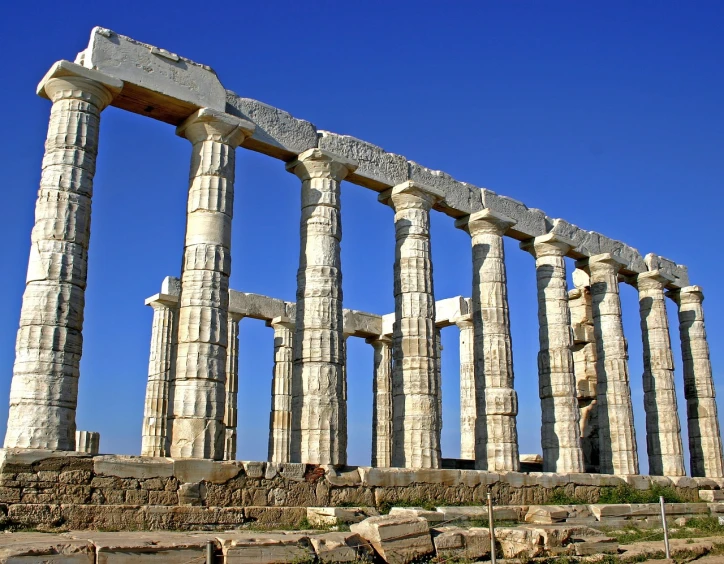 the ruins of an ancient greek temple against a blue sky, a picture, by Alexander Scott, pixabay contest winner, giant columns palace, the city of atlantis, silver, instrument