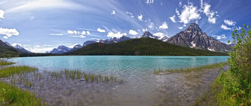 a lake with a mountain in the background, a photo, by Brigette Barrager, 3 6 0 panorama, puddles of turquoise water, canada, iso 1 0 0 wide view